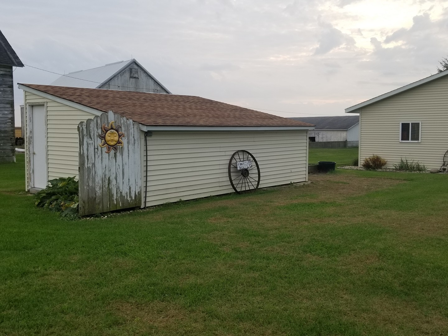 18869 Star Road Prophetstown, IL 61277 - Photo 18 of 20 a front view of a house with garden