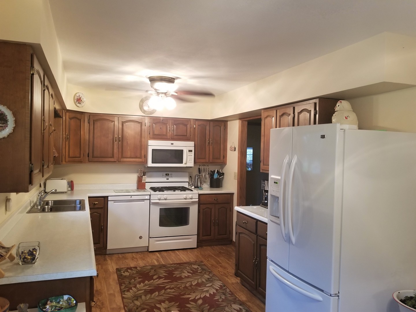 18869 Star Road Prophetstown, IL 61277 - Photo 3 of 20 a kitchen with a refrigerator sink and stove