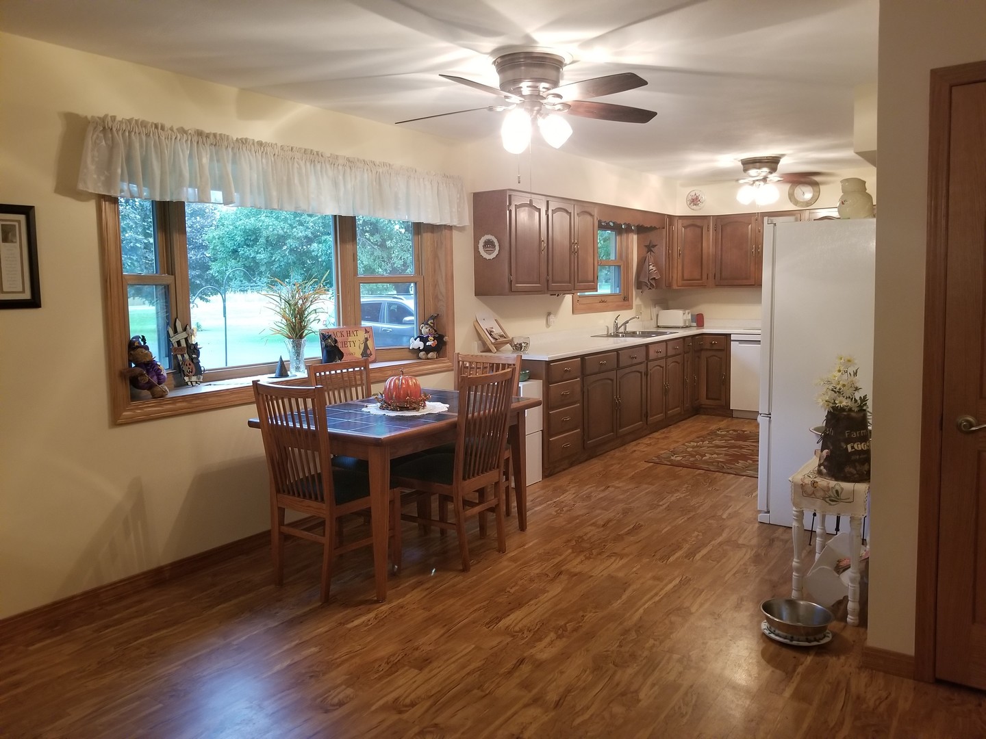 18869 Star Road Prophetstown, IL 61277 - Photo 5 of 20 a view of a dining room with furniture window and wooden floor