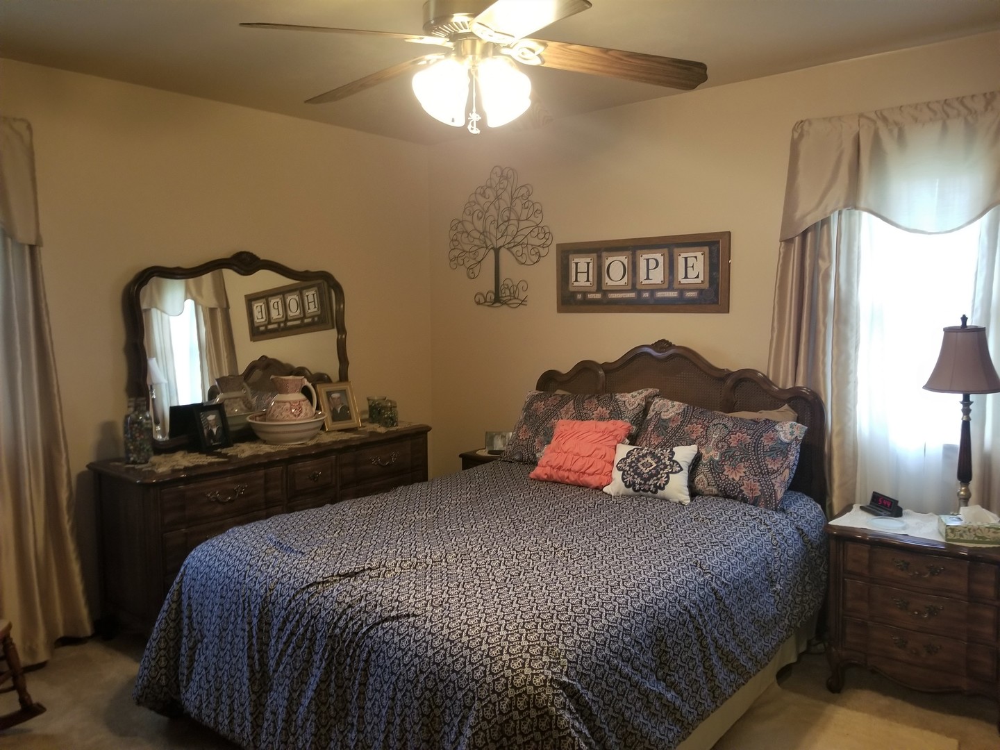 18869 Star Road Prophetstown, IL 61277 - Photo 8 of 20 a bedroom with a bed and a chandelier