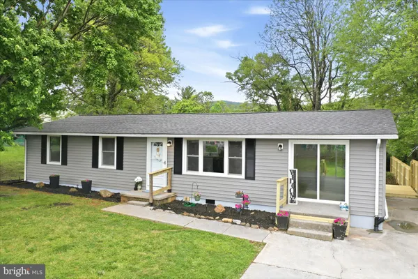 a house view with a garden space