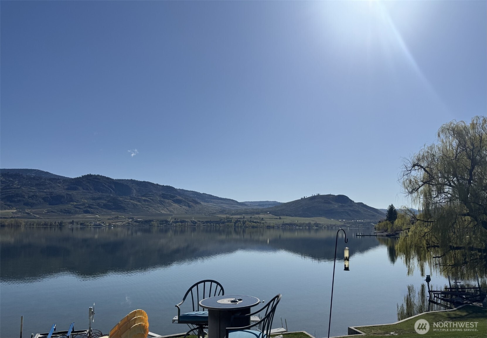 10 Turtle Lane Oroville, WA 98844 - Photo 4 of 6 a view of lake with mountain and trees