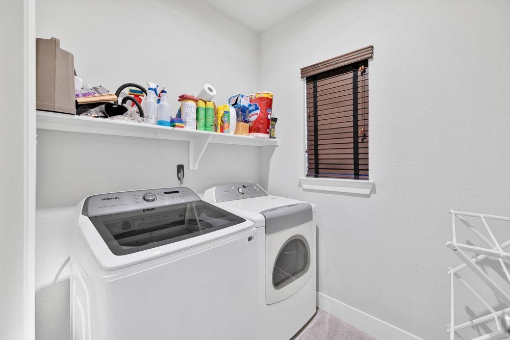 2044 Longbridge Road Forney, TX 75126 - Photo 22 of 40 a utility room with dryer and washer