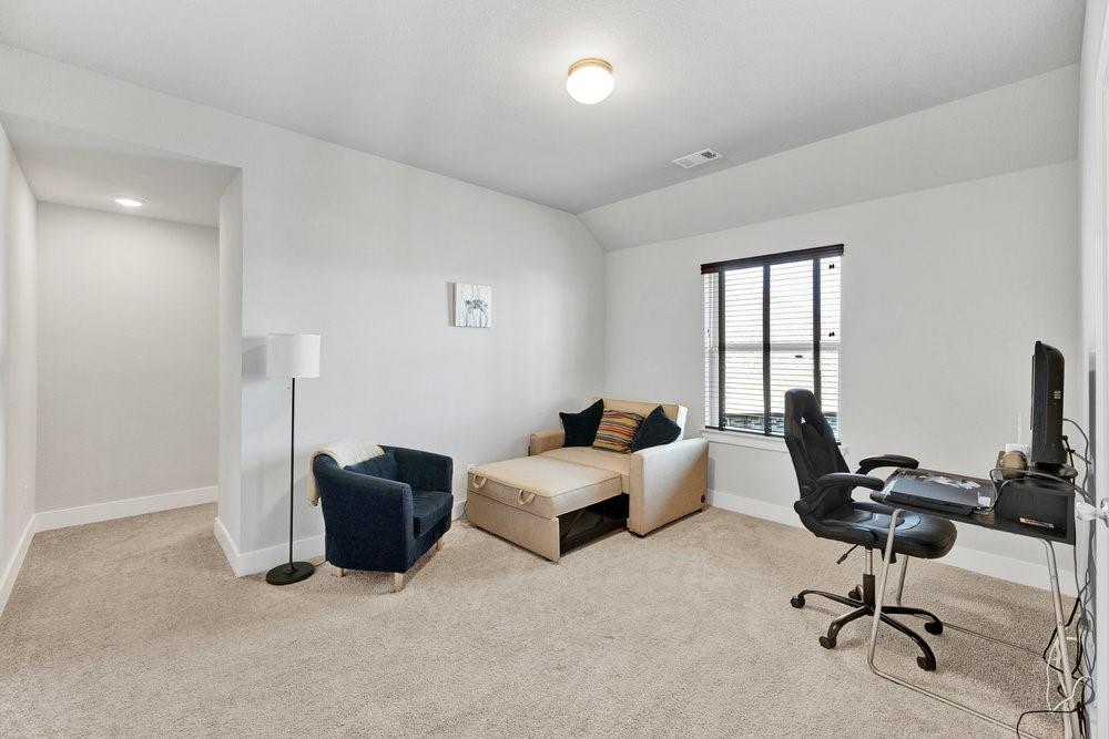 2044 Longbridge Road Forney, TX 75126 - Photo 26 of 40 a living room with furniture