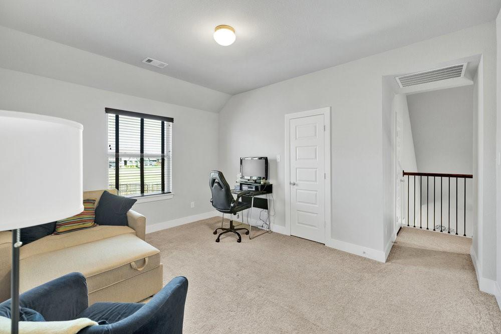 2044 Longbridge Road Forney, TX 75126 - Photo 27 of 40 a living room with furniture and a window