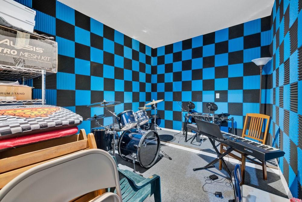 2044 Longbridge Road Forney, TX 75126 - Photo 30 of 40 a bedroom with a bed and a chair