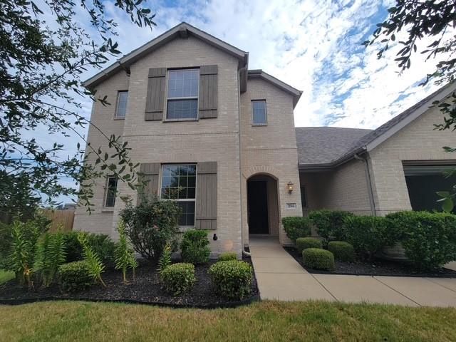 2044 Longbridge Road Forney, TX 75126 - Photo 3 of 40 a front view of a house with garden