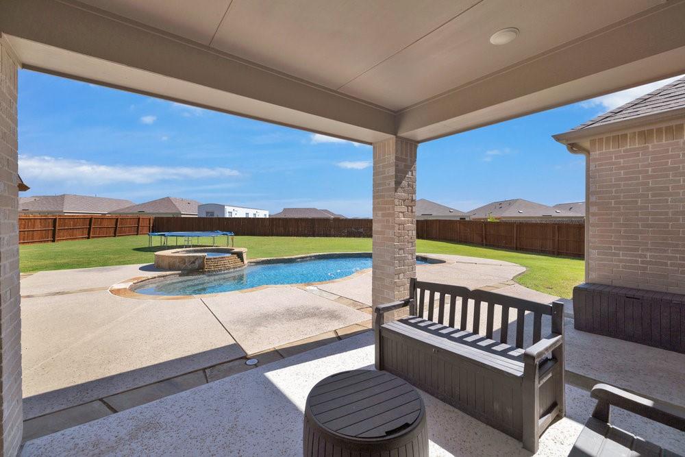2044 Longbridge Road Forney, TX 75126 - Photo 32 of 40 a view of a two chairs in the roof deck