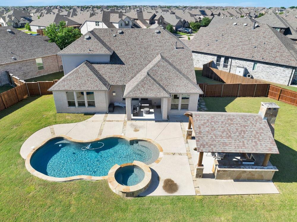 2044 Longbridge Road Forney, TX 75126 - Photo 38 of 40 an aerial view of a house with swimming pool garden and patio