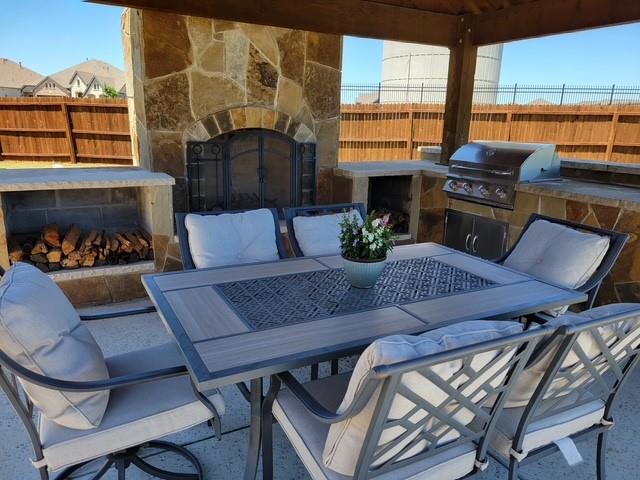 2044 Longbridge Road Forney, TX 75126 - Photo 40 of 40 a view of a dining room with furniture window and outside view