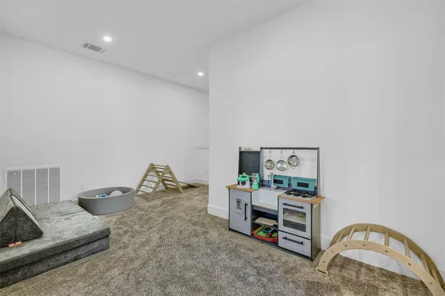 a bedroom with furniture and a couch