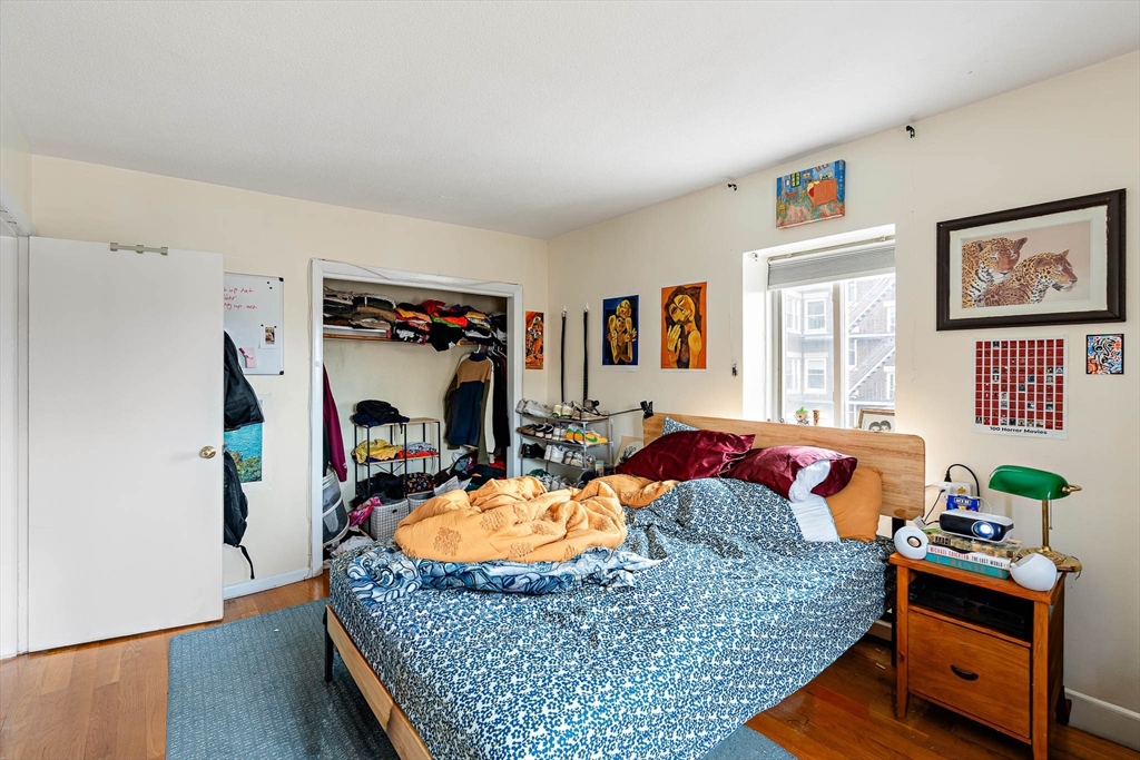 10 Scottfield Road, Unit 34 Boston, MA 02134 - Photo 13 of 19 a living room with furniture and a couch