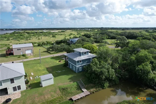 a view of a room and window