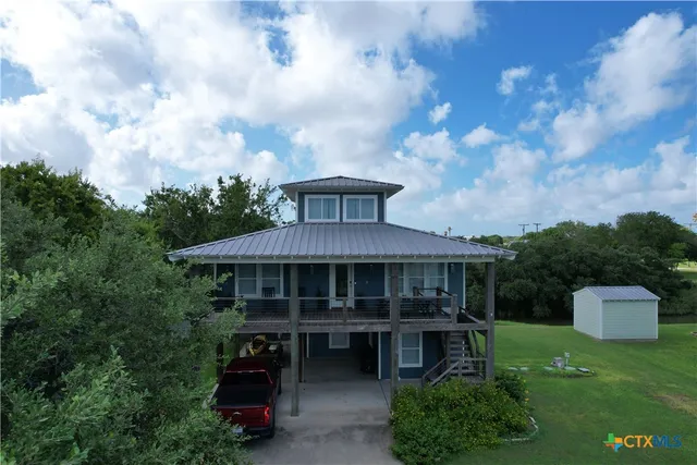 a view of a house with a balcony