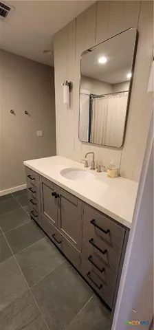 a bathroom with a toilet and a sink