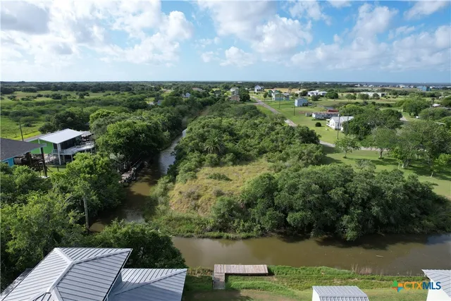 an aerial view of a house with a garden
