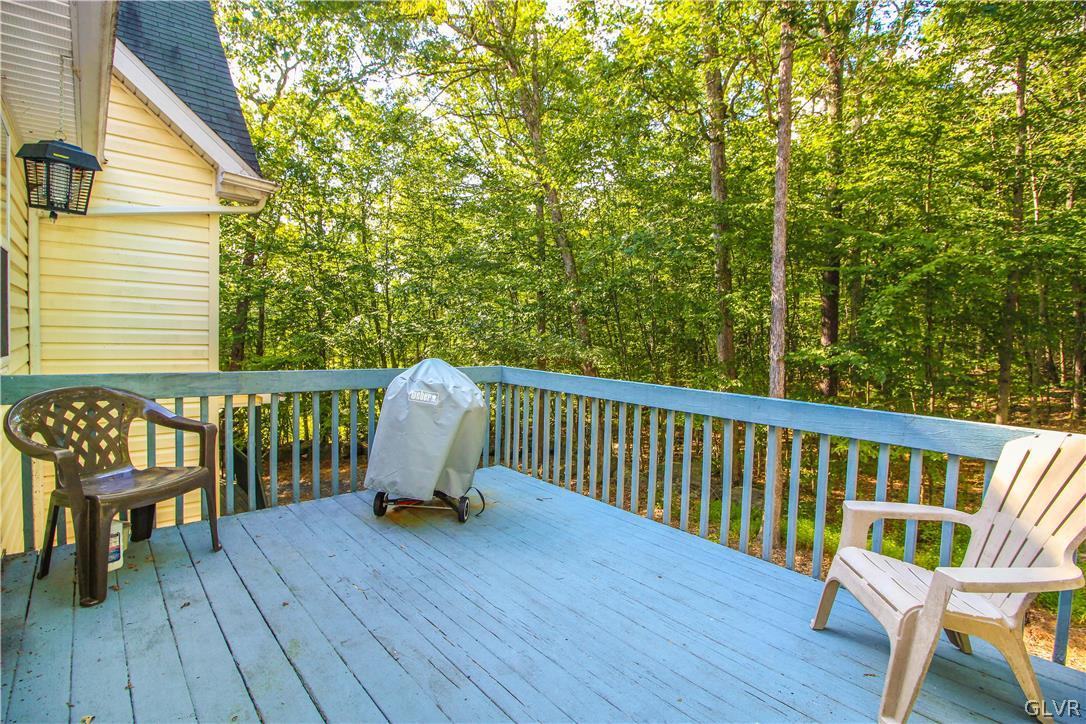 4219 Winchester Way Bushkill, PA 18324 - Photo 2 of 49 a view of balcony with wooden floor and outdoor seating