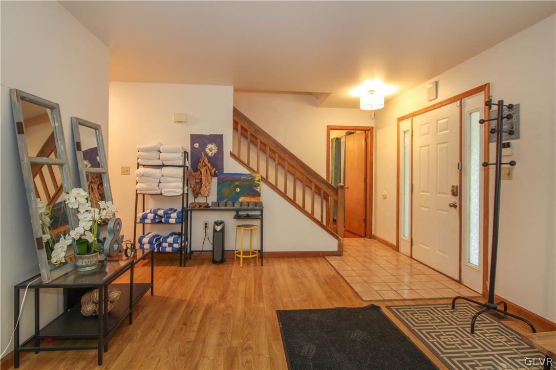 4219 Winchester Way Bushkill, PA 18324 - Photo 30 of 49 a view of entryway and hall with wooden floor