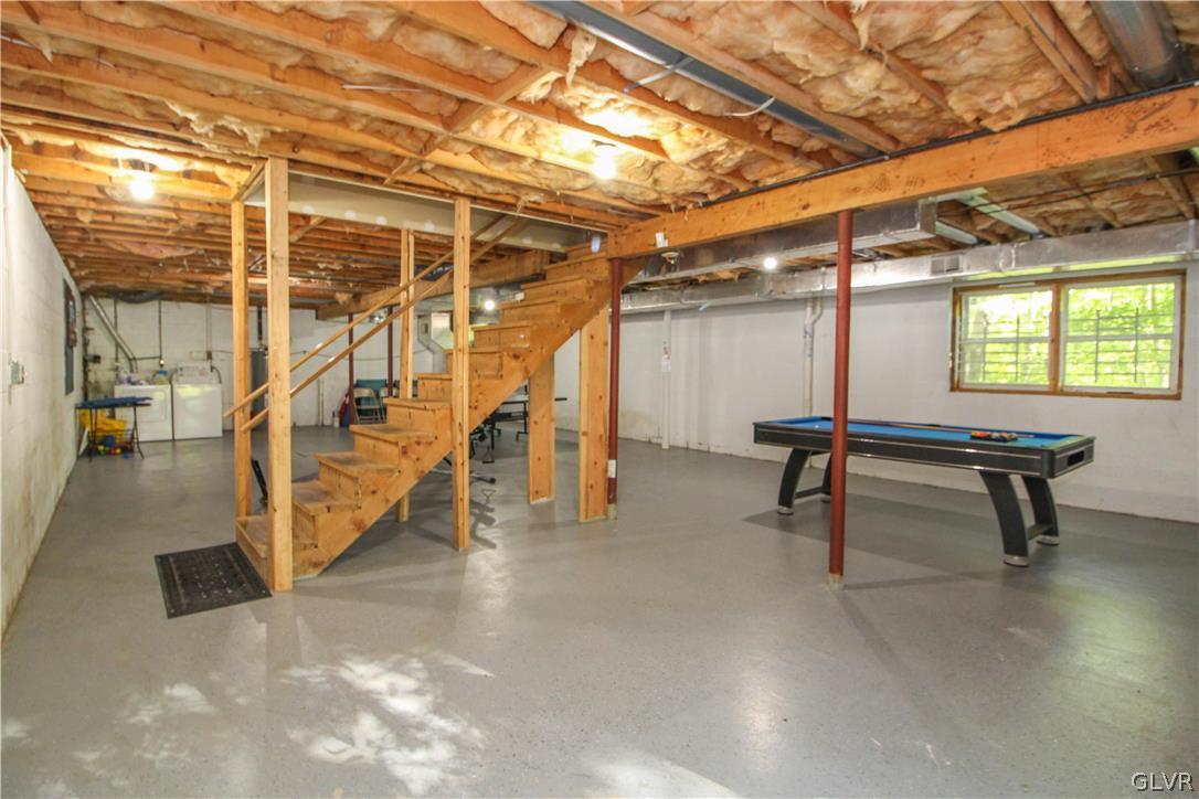 4219 Winchester Way Bushkill, PA 18324 - Photo 33 of 49 a view of a room with stairs and wooden floor