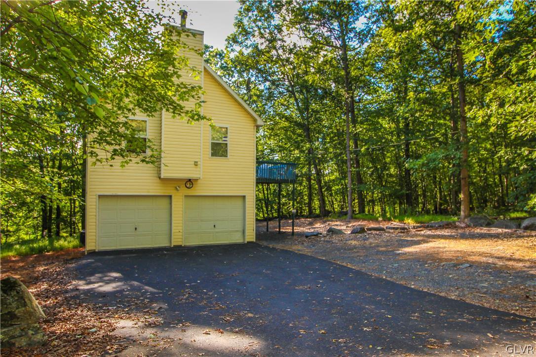 4219 Winchester Way Bushkill, PA 18324 - Photo 40 of 49 a view of a house with a yard