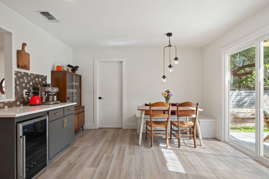 4705 Old Castle Road Austin, TX 78745 - Photo 15 of 32 While the nearby breakfast nook creates a cozy spot for morning coffee.