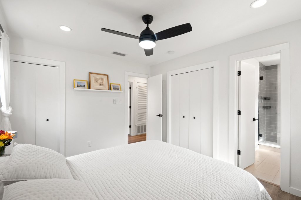4705 Old Castle Road Austin, TX 78745 - Photo 19 of 32 The primary suite features two closets.