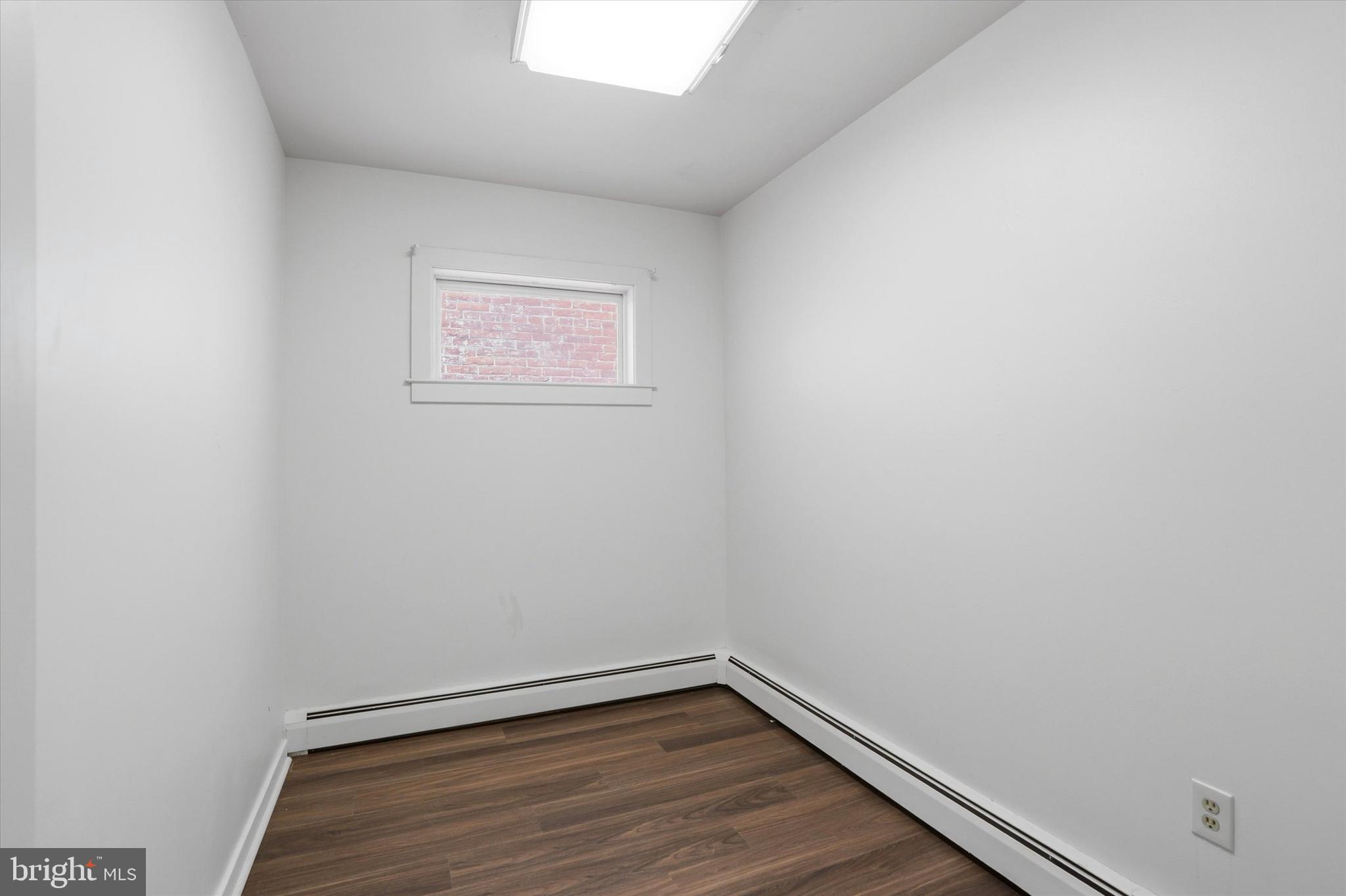 112 North 11th Street, Unit 1 Reading, PA 19601 - Photo 5 of 17 a view of a small space with wooden floor