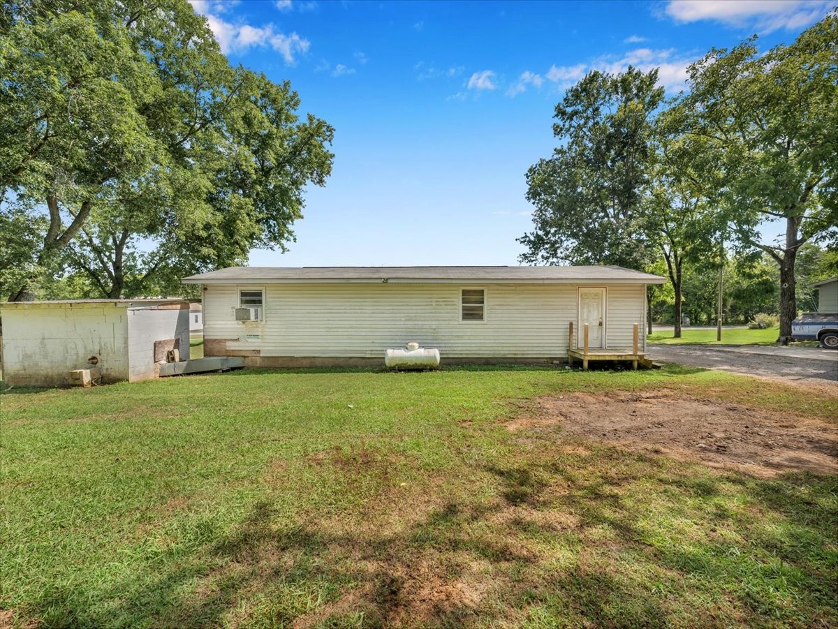 707 Molino Road Taft, TN 38488 - Photo 5 of 28 a house view with a garden space