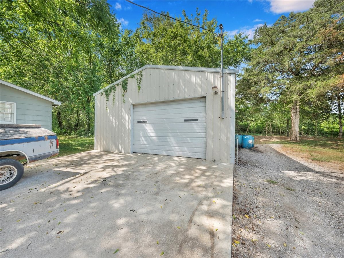 707 Molino Road Taft, TN 38488 - Photo 9 of 28 a house view with a backyard space
