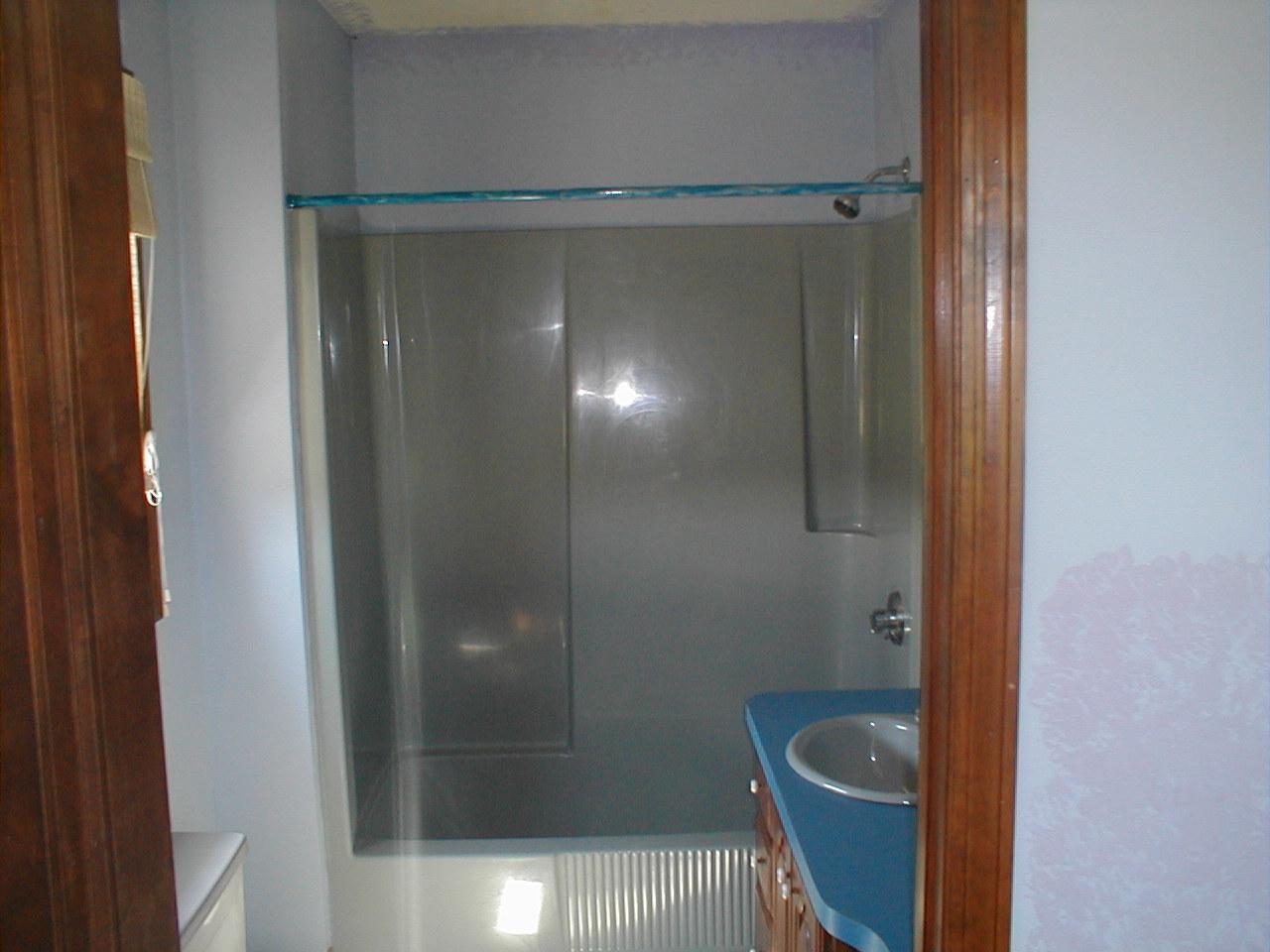 1410 Peru Road Windsor, MA 01270 - Photo 11 of 12 a bathroom with a glass shower door