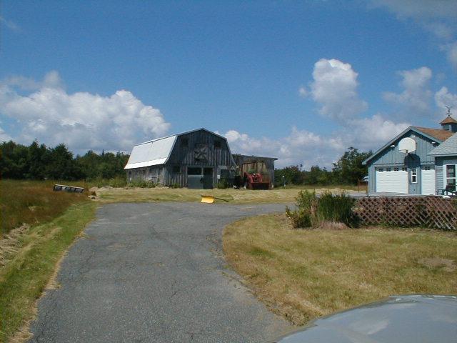 1410 Peru Road Windsor, MA 01270 - Photo 4 of 12 a front view of a house with a yard
