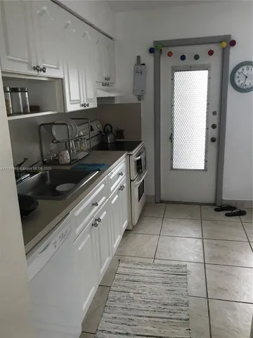 $300,000 | 1075 93rd Street, Unit 404, Bay Harbor Islands, FL 33154