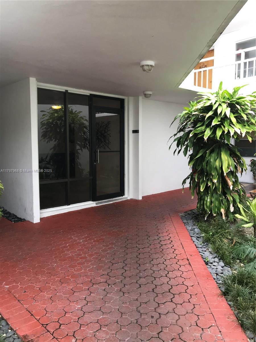 1075 93rd Street, Unit 404 Bay Harbor Islands, FL 33154 - Photo 7 of 14 a view of backyard with garden