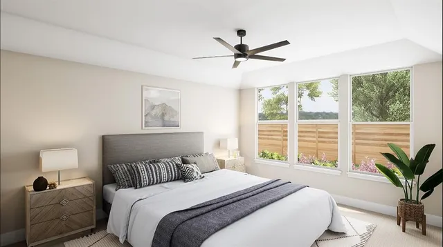 a bedroom with a large bed and a window