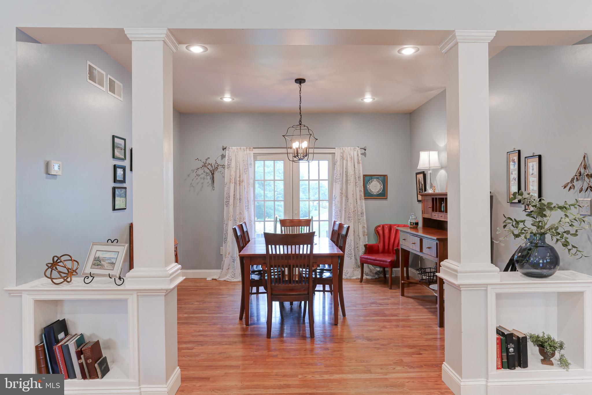 10 Elser Hill Road Lititz, PA 17543 - Photo 15 of 63 a view of a dining room with furniture window and wooden floor