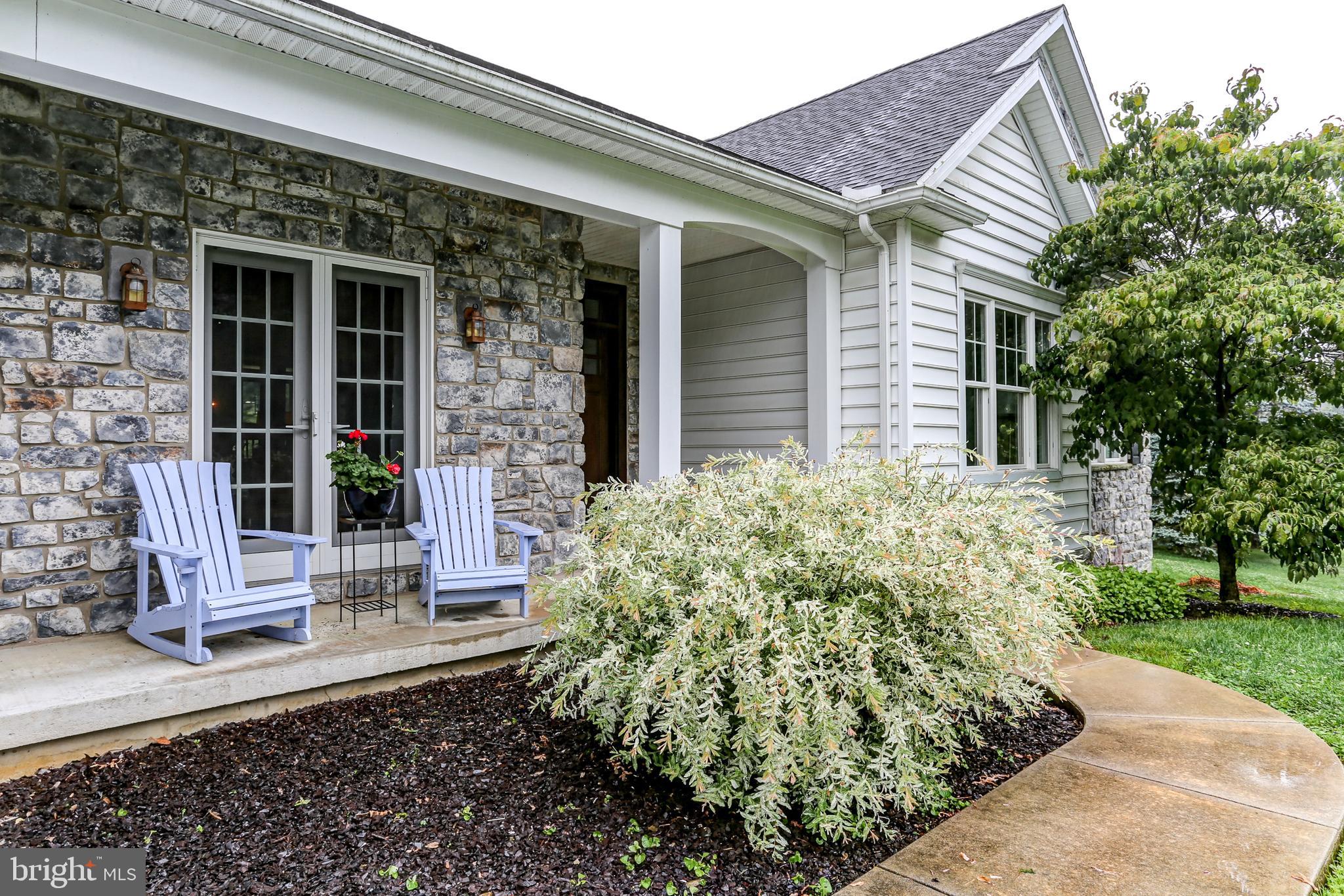 10 Elser Hill Road Lititz, PA 17543 - Photo 2 of 63 front view of a house with a garden