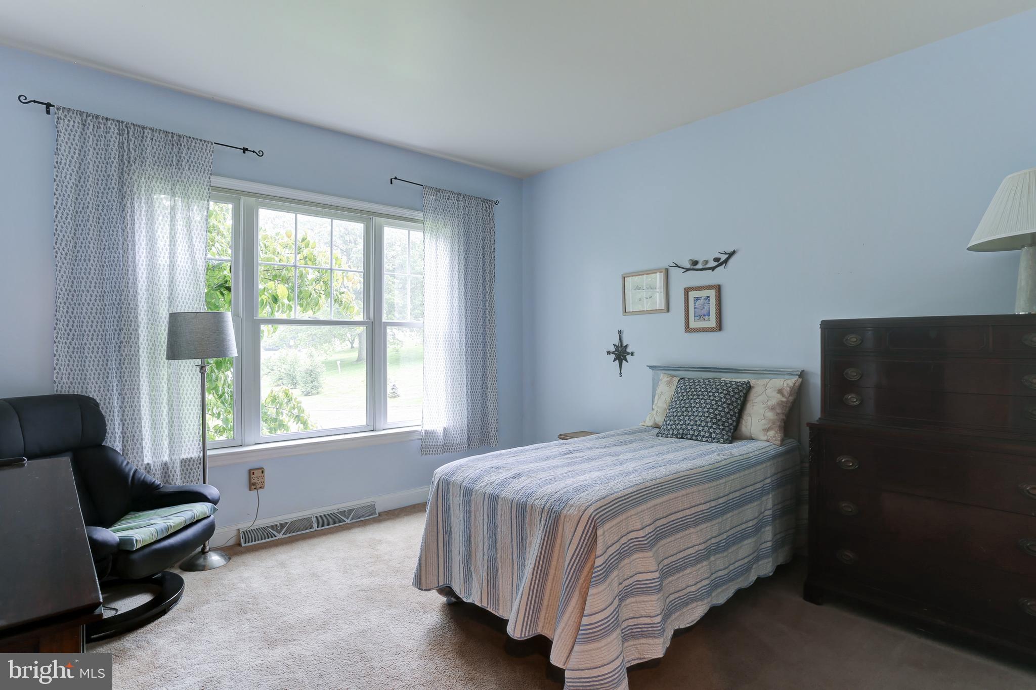 10 Elser Hill Road Lititz, PA 17543 - Photo 29 of 63 a bedroom with a bed and a couch