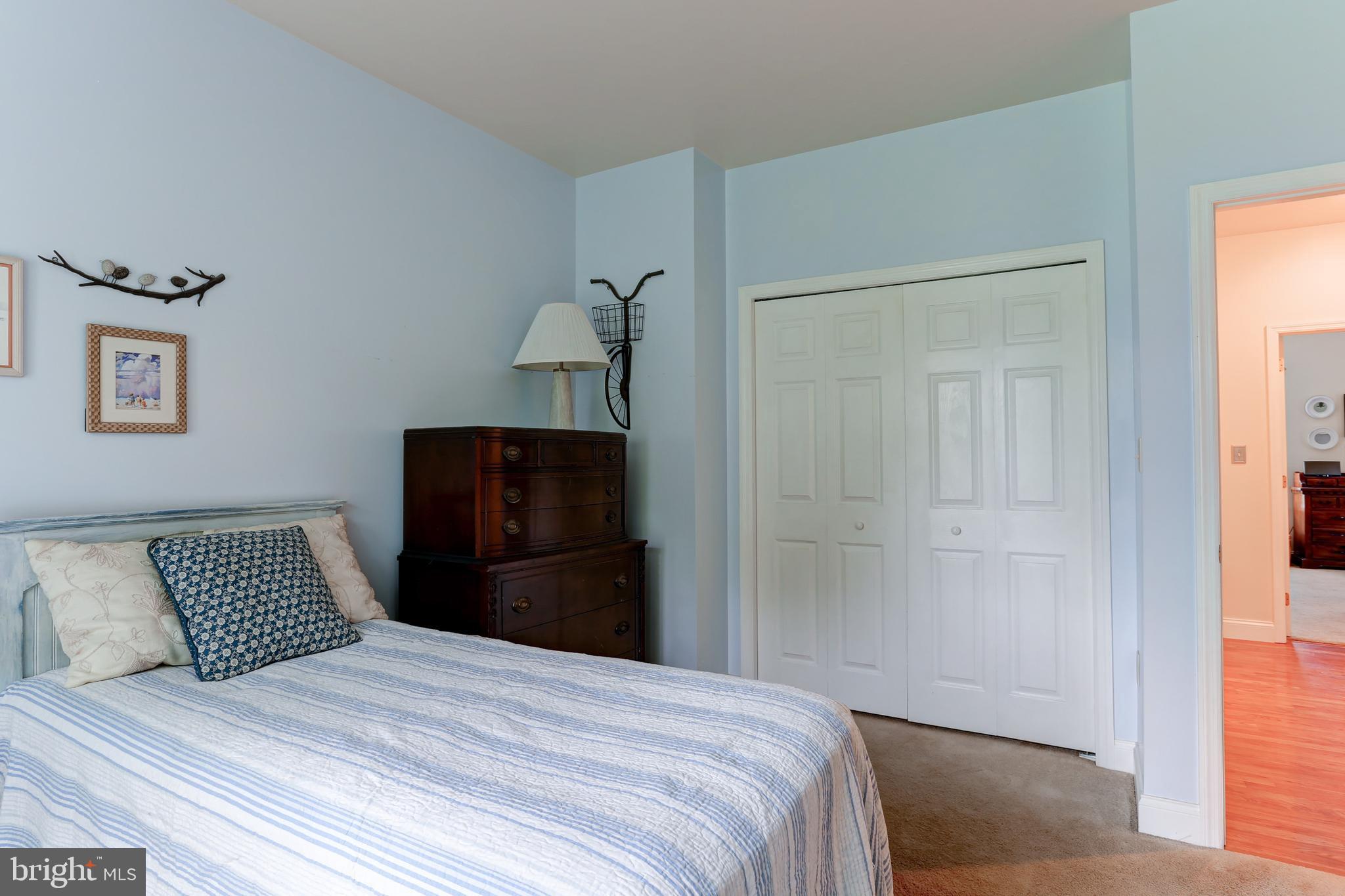10 Elser Hill Road Lititz, PA 17543 - Photo 30 of 63 a bedroom with a bed and wooden floor