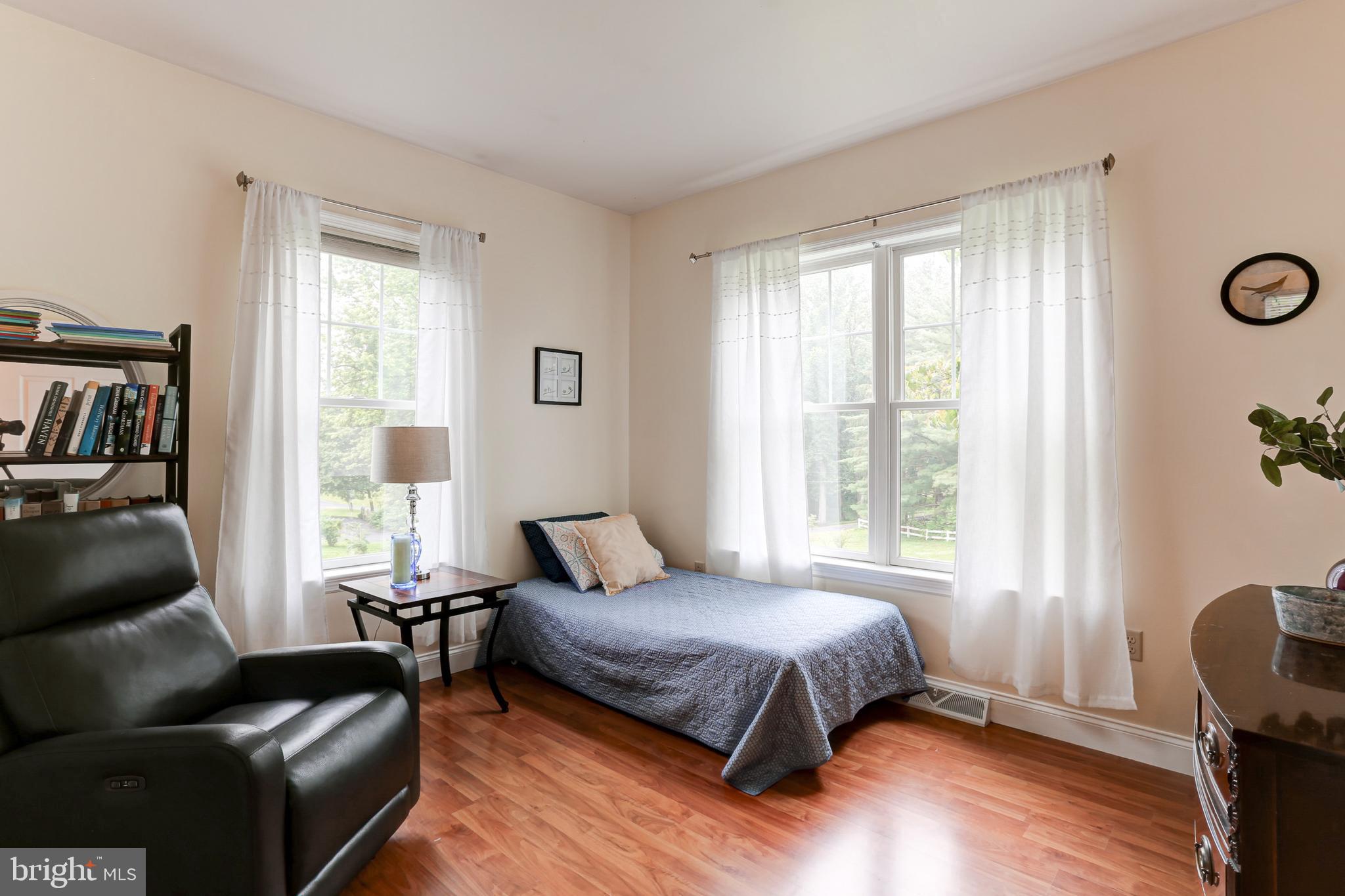 10 Elser Hill Road Lititz, PA 17543 - Photo 31 of 63 a bedroom with a bed couch and a window