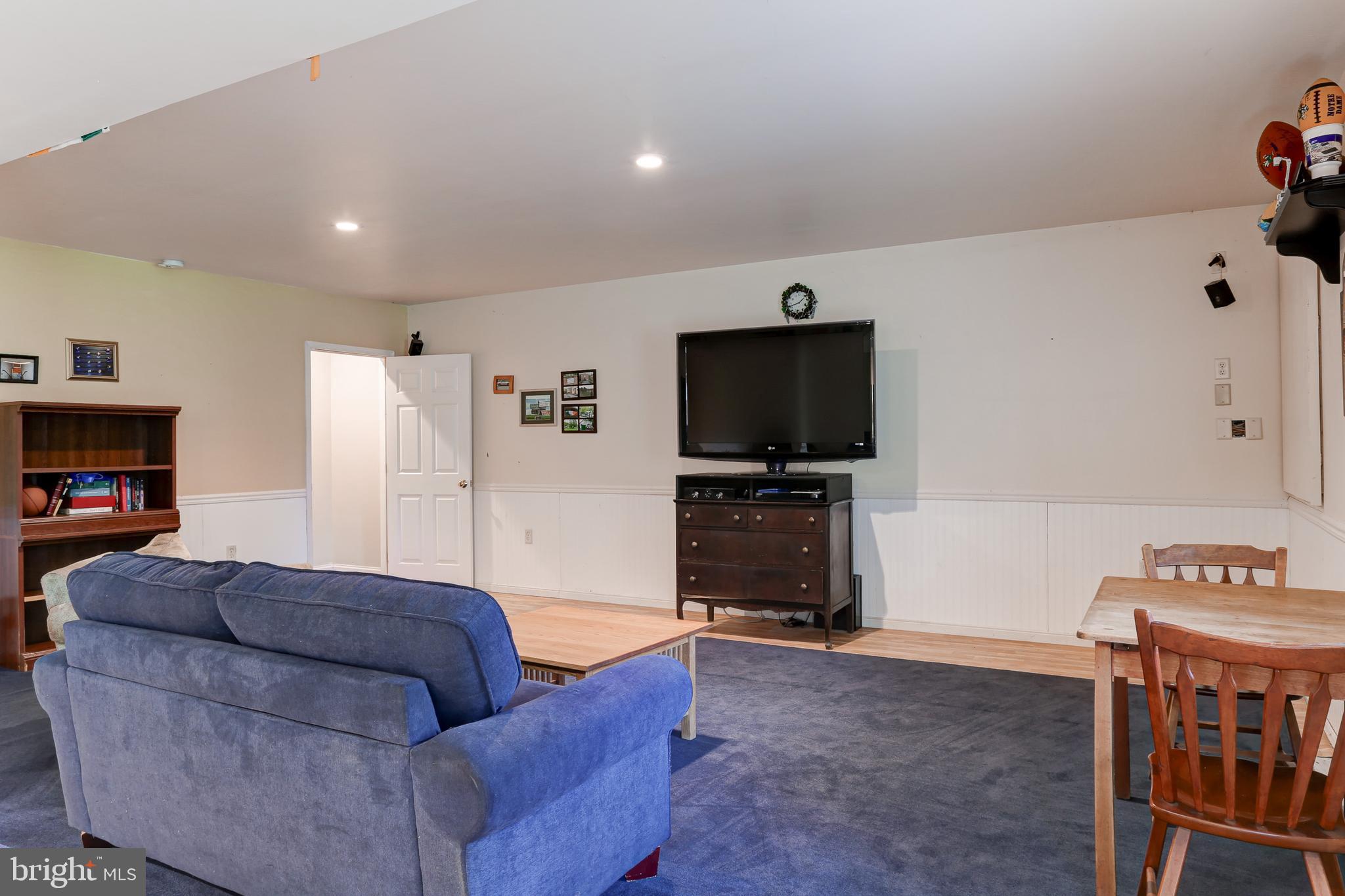 10 Elser Hill Road Lititz, PA 17543 - Photo 38 of 63 a living room with furniture and a flat screen tv