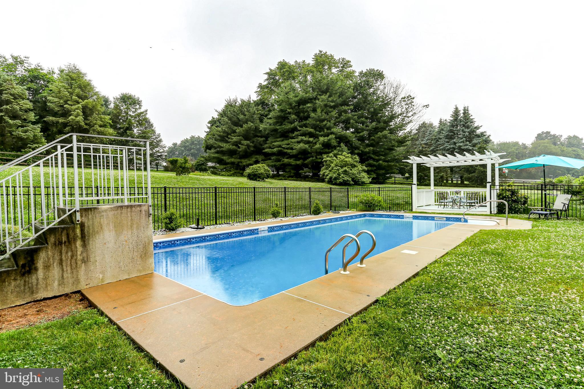 10 Elser Hill Road Lititz, PA 17543 - Photo 46 of 63 a view of a yard with a swimming pool