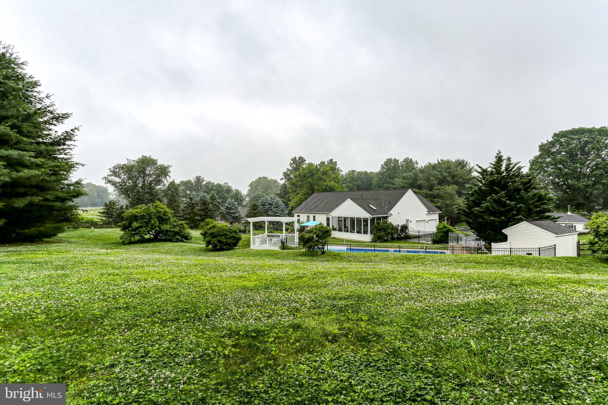10 Elser Hill Road Lititz, PA 17543 - Photo 49 of 63 a front view of a house with a yard and trees