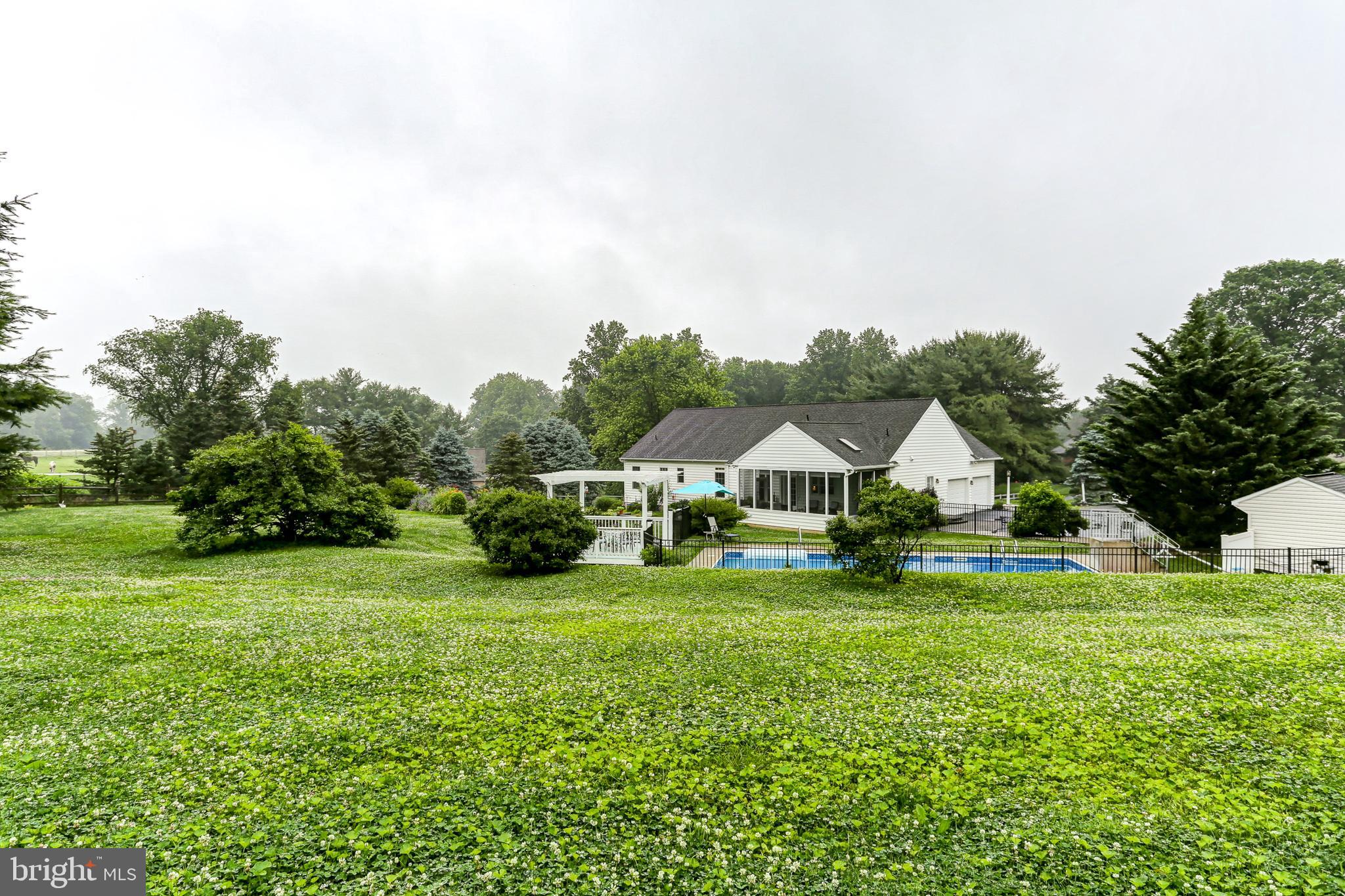 10 Elser Hill Road Lititz, PA 17543 - Photo 50 of 63 a view of a house with a yard and garage