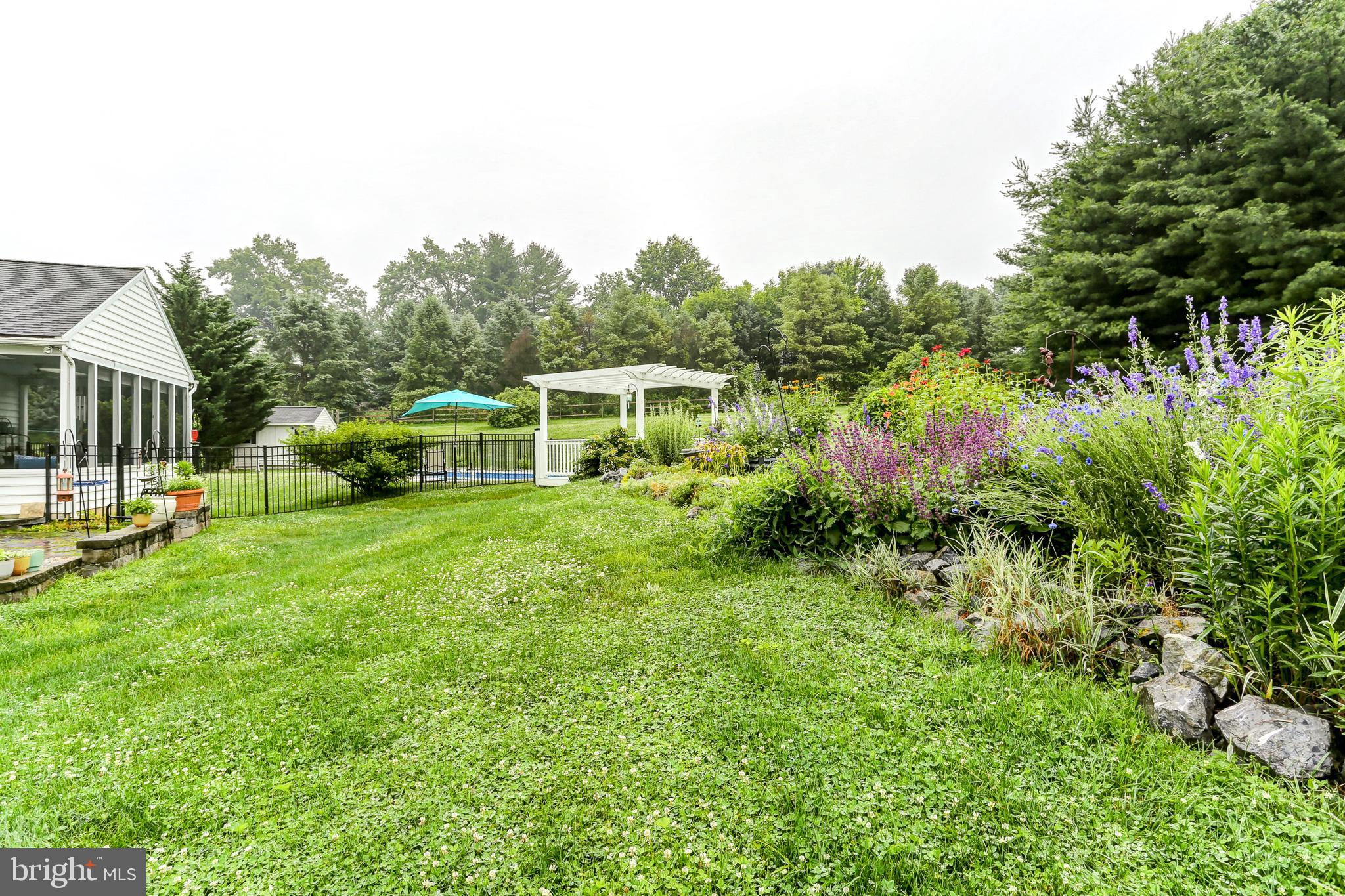 10 Elser Hill Road Lititz, PA 17543 - Photo 52 of 63 a view of a house with backyard and sitting area
