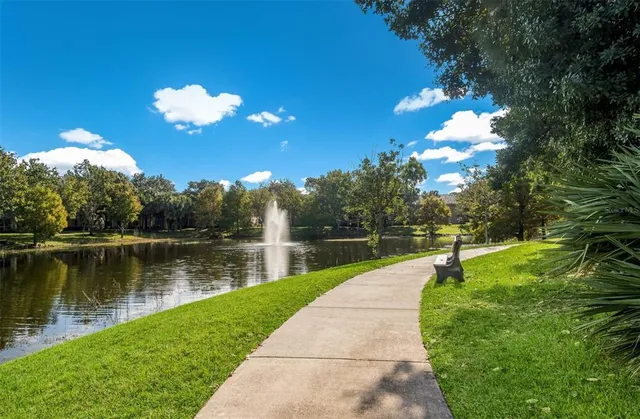 a view of a lake with a garden