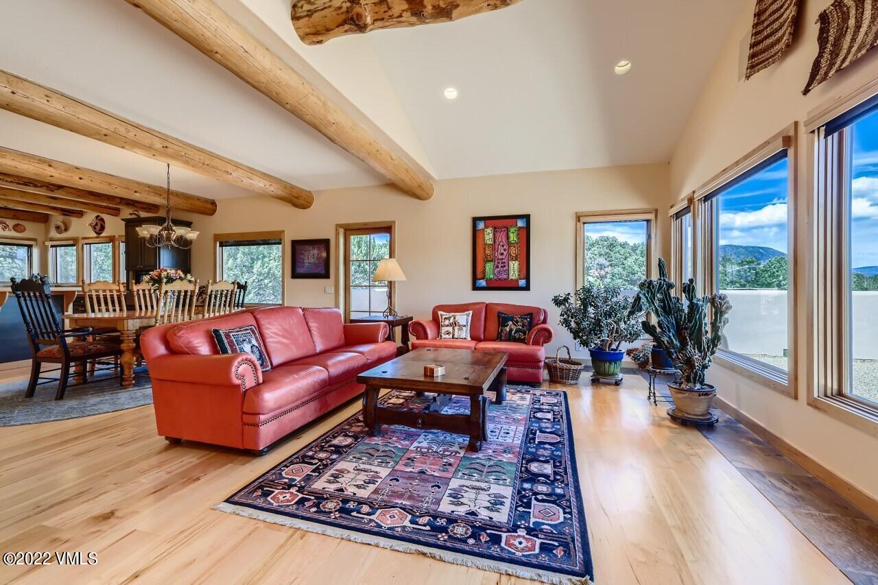 417 Neilson Gulch Road Eagle, CO 81631 - Photo 7 of 28 a living room with furniture and a rug