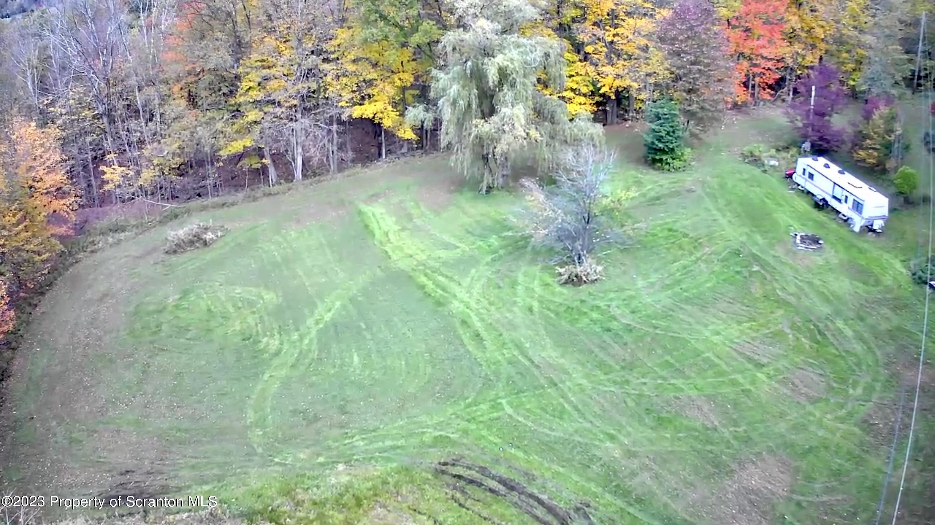 65 Powell Road Union Dale, PA 18470 - Photo 15 of 20 a backyard of a house with lots of green space