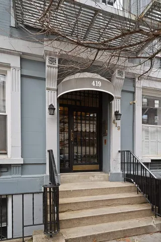 a view of entryway with a front door