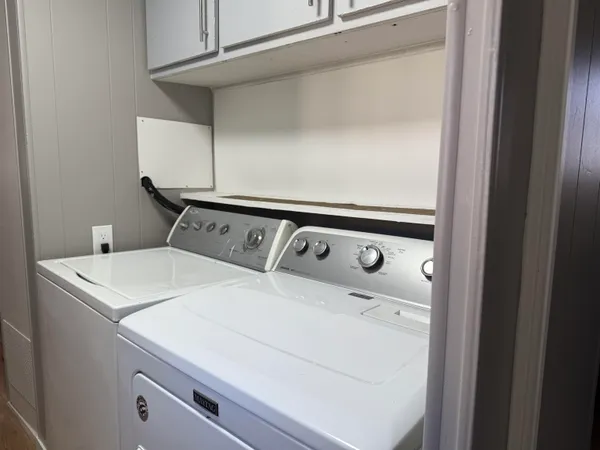 a close up view of a washer and dryer