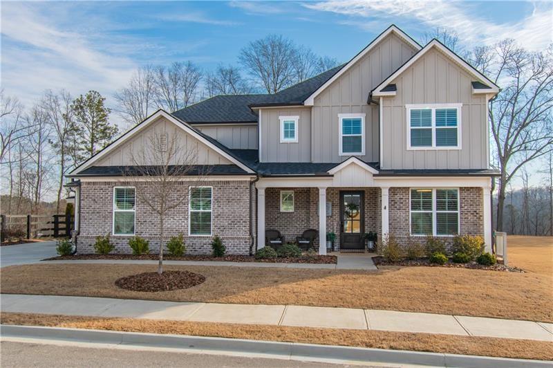 226 Carmichael Drive Canton, GA 30115 - Photo 1 of 1 a front view of a house with yard